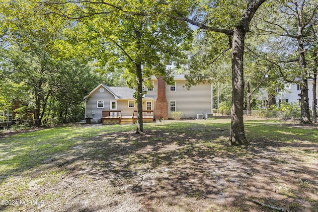 view of yard featuring a deck