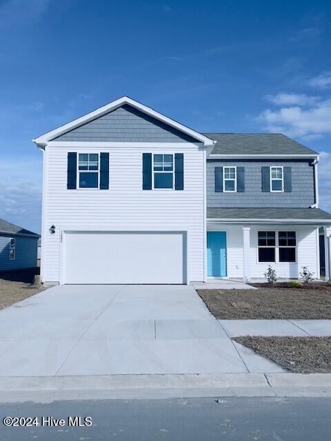 view of property with a garage