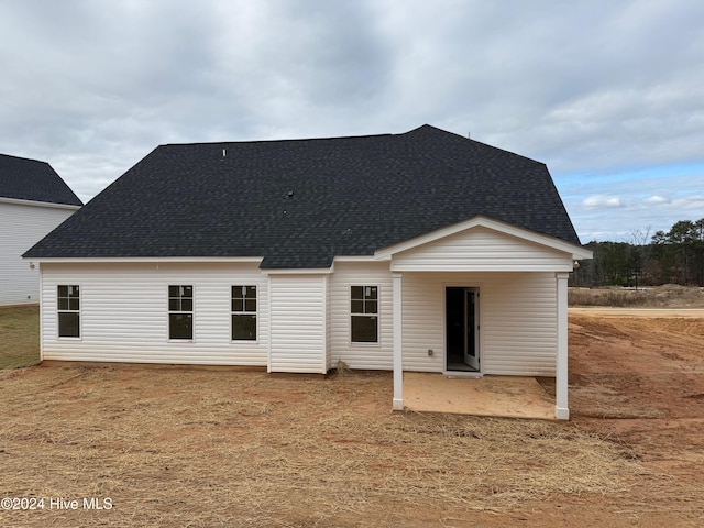 rear view of house with a patio