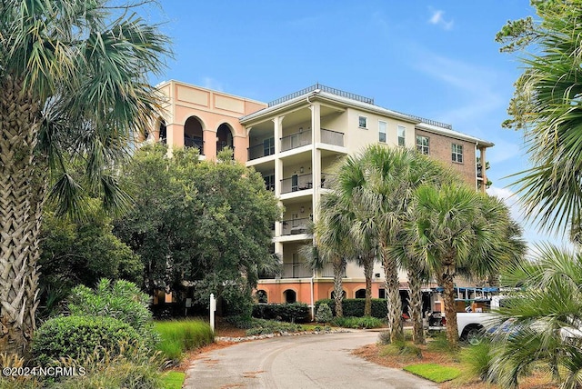 view of property featuring driveway