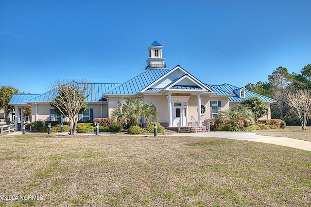 view of front of home with a front lawn