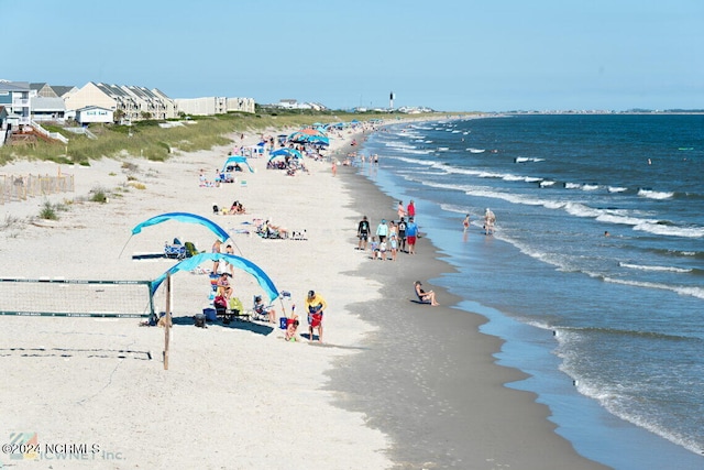 property view of water featuring a beach view