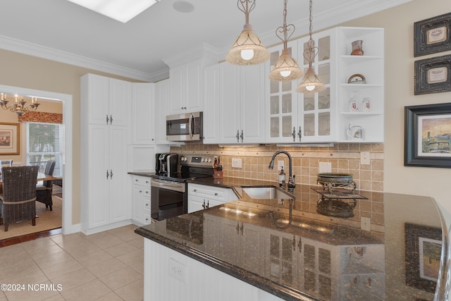 kitchen featuring open shelves, appliances with stainless steel finishes, glass insert cabinets, and white cabinets