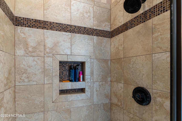 details featuring a tile shower