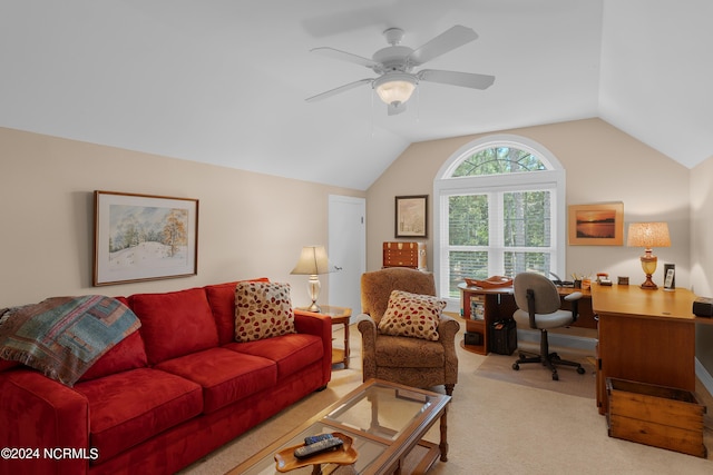 living room with light carpet, vaulted ceiling, and a ceiling fan