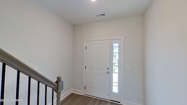 foyer featuring dark wood-type flooring