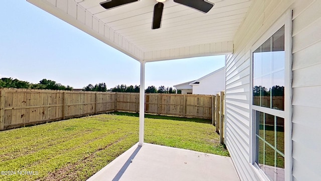 view of yard with a fenced backyard and a patio