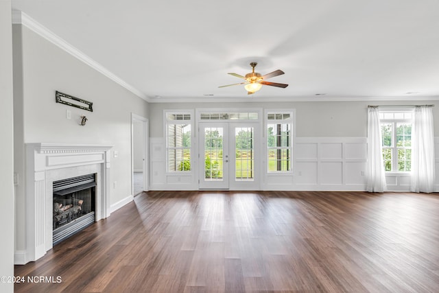 unfurnished living room with ceiling fan, crown molding, wood-type flooring, and french doors