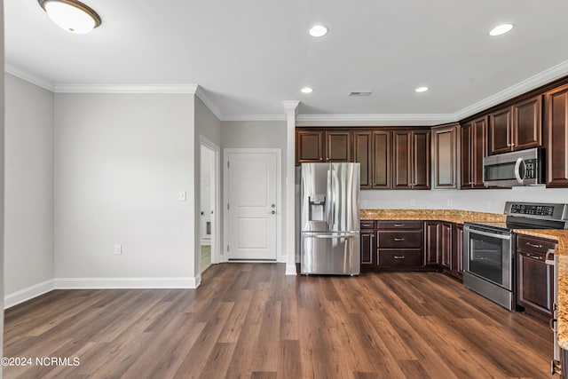 kitchen featuring appliances with stainless steel finishes, dark brown cabinetry, dark hardwood / wood-style floors, and light stone countertops