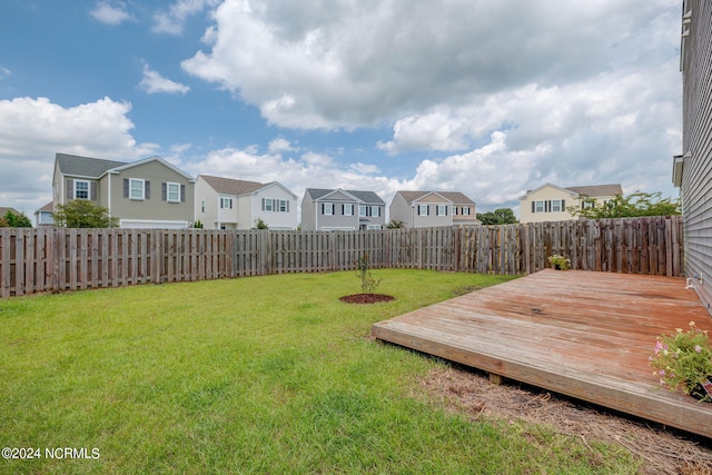 view of yard featuring a deck