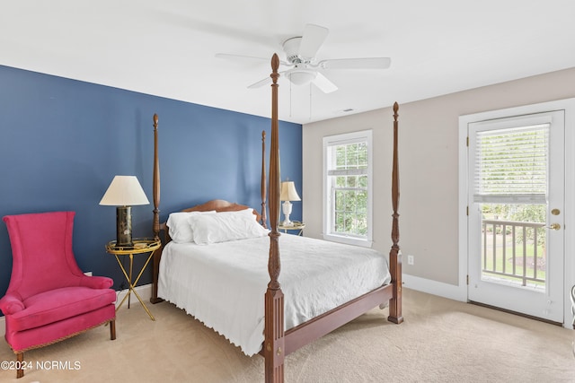 carpeted bedroom featuring ceiling fan and access to exterior