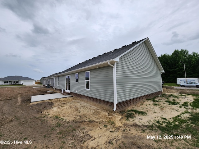 235 Nugget Trl, Elizabeth City, NC 27909 - view of property exterior with roof with shingles
