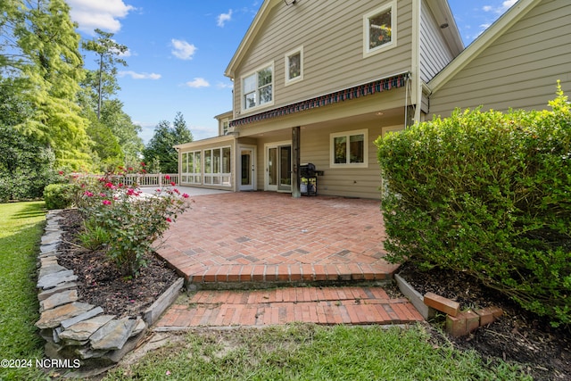 back of house featuring a patio area