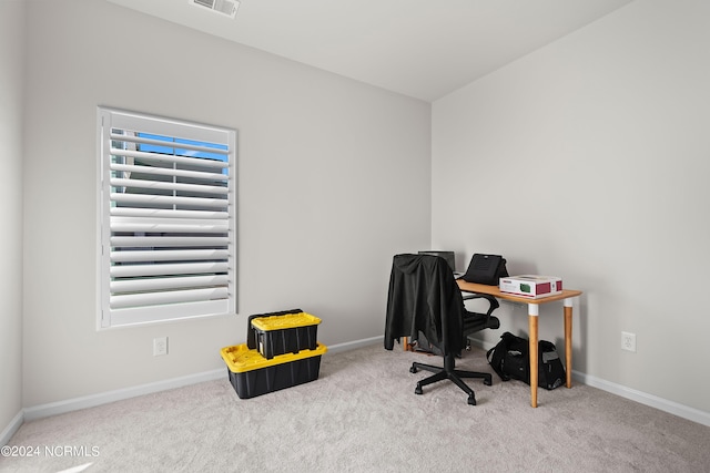 carpeted office with plenty of natural light