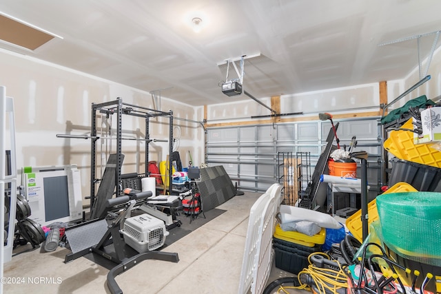 garage featuring a garage door opener