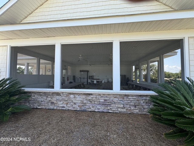 view of patio / terrace with a sunroom