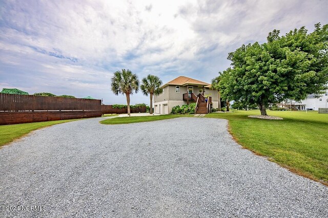 view of front of property with a front lawn