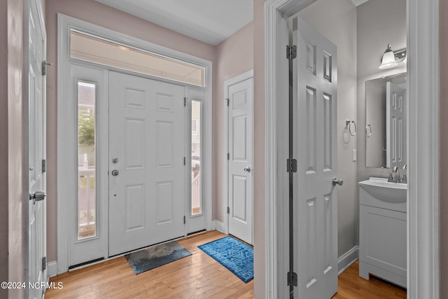 entryway featuring light wood-style floors