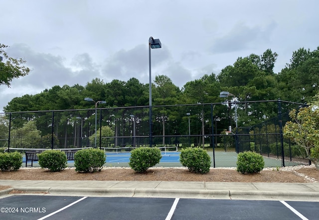 exterior space featuring tennis court