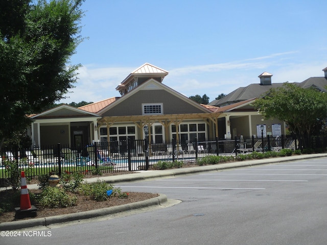 view of property with a community pool