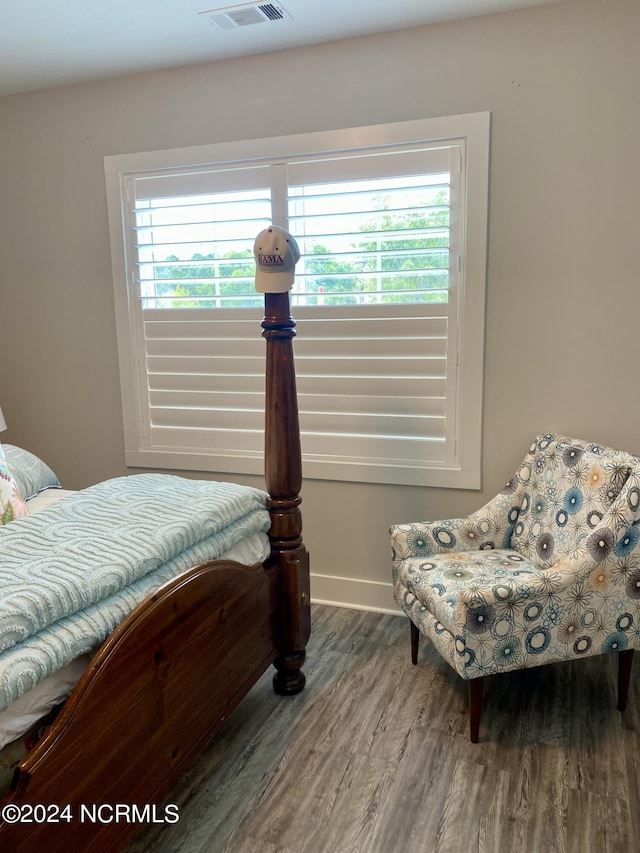 bedroom featuring wood-type flooring