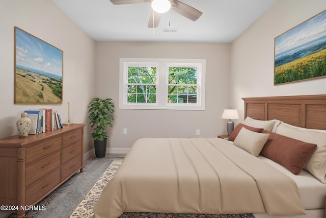 carpeted bedroom featuring ceiling fan