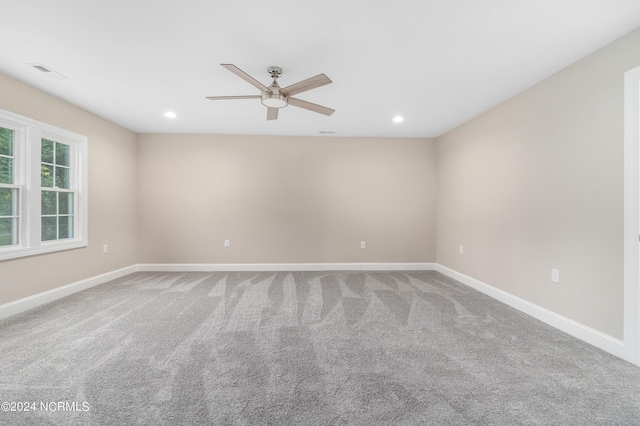 unfurnished room featuring carpet flooring and ceiling fan