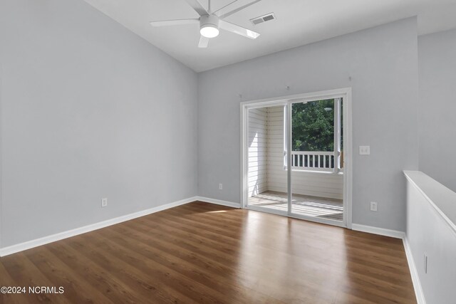 unfurnished room with hardwood / wood-style flooring and ceiling fan