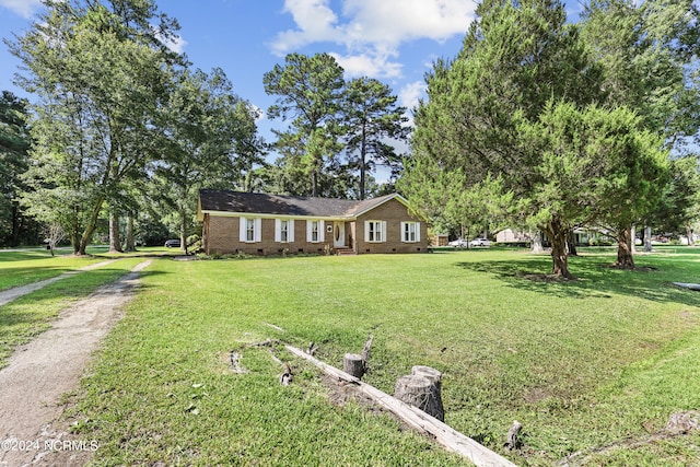 ranch-style house with a front yard