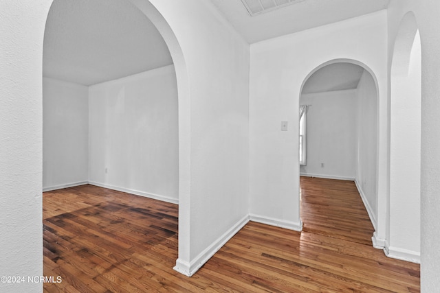 hall featuring wood-type flooring