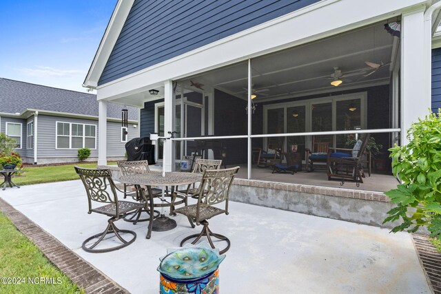 view of patio / terrace featuring ceiling fan