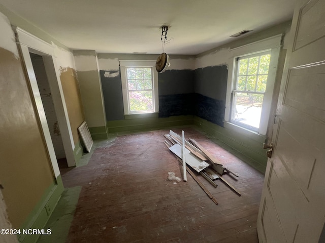 unfurnished dining area featuring visible vents