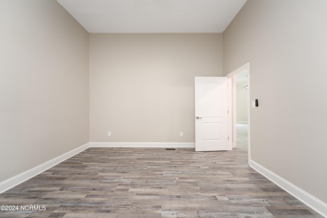 spare room with light wood-type flooring