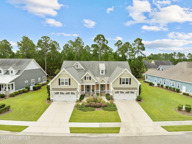 view of front of property featuring a front lawn and a garage