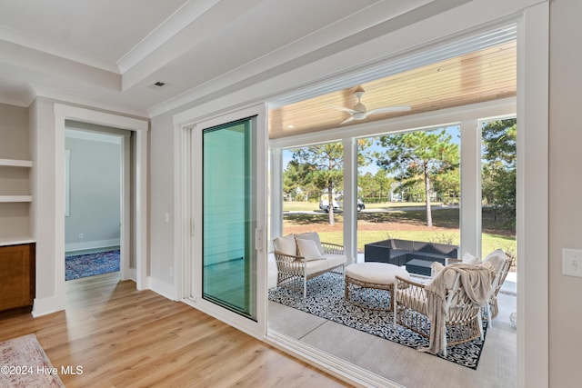 interior space with a tray ceiling and visible vents