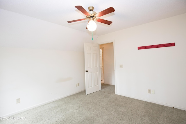 unfurnished room with a ceiling fan, carpet flooring, and baseboards