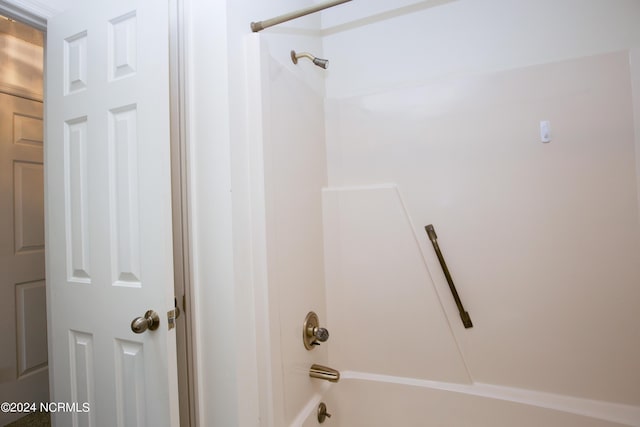 bathroom featuring washtub / shower combination