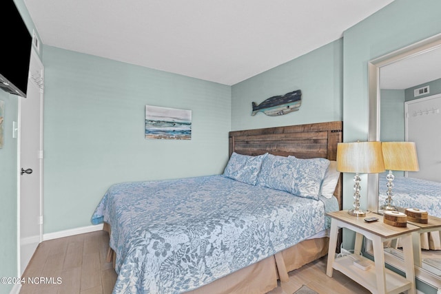 bedroom featuring hardwood / wood-style flooring