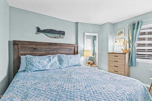 bedroom with a textured ceiling