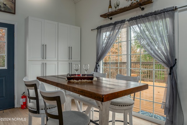 dining space featuring light wood-type flooring