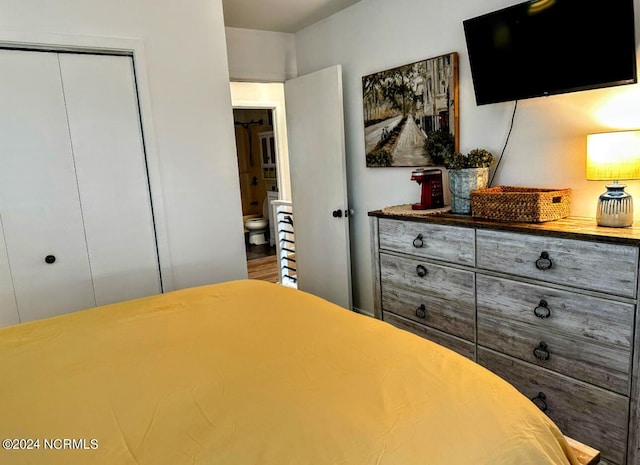 bedroom with wood-type flooring