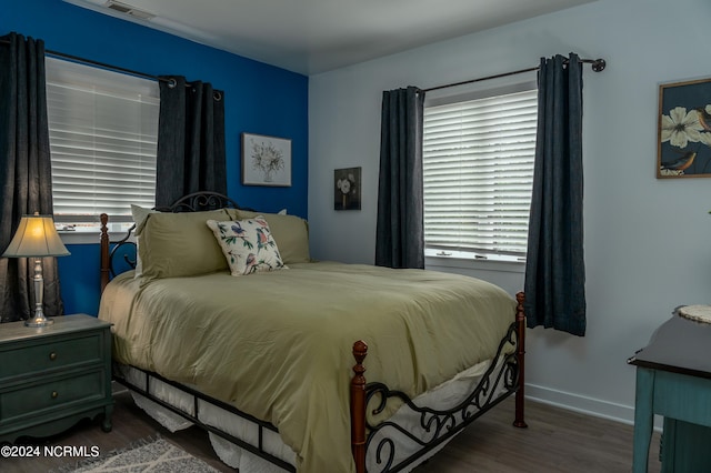 bedroom featuring hardwood / wood-style floors