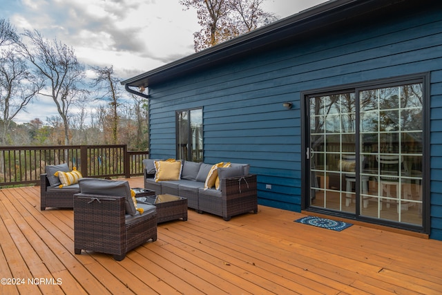 deck with an outdoor hangout area