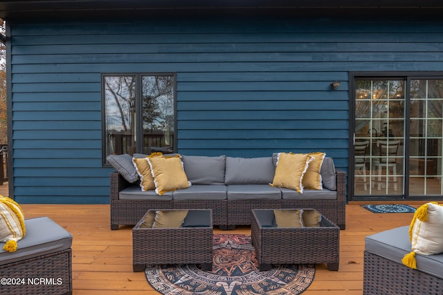 wooden terrace featuring outdoor lounge area