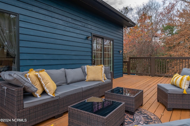 deck with an outdoor hangout area