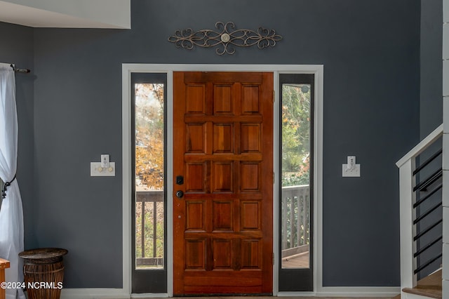 foyer entrance featuring plenty of natural light