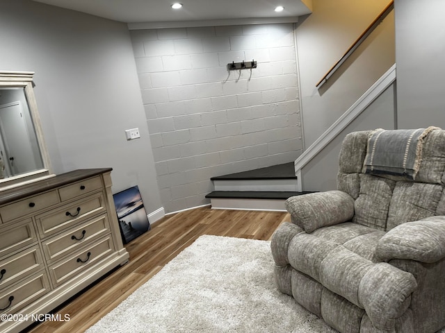 sitting room featuring hardwood / wood-style flooring