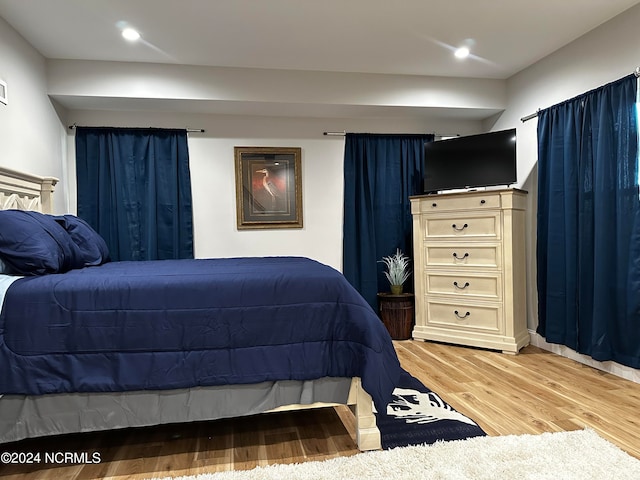 bedroom featuring hardwood / wood-style flooring