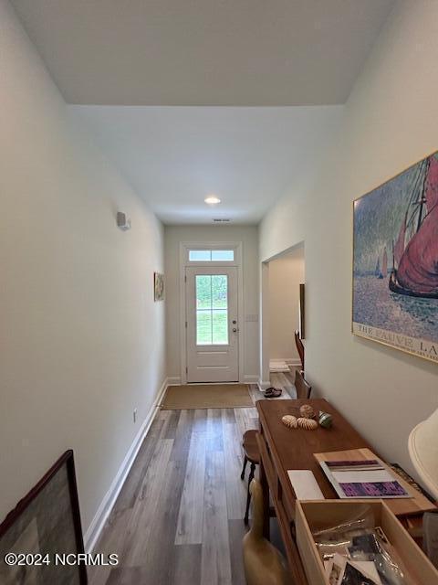 doorway to outside featuring hardwood / wood-style floors