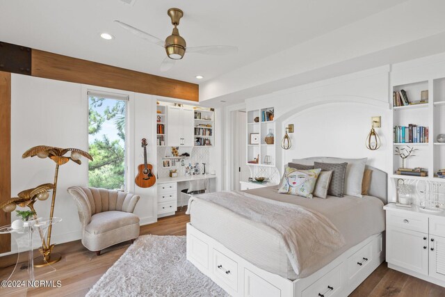 bedroom featuring ceiling fan and light hardwood / wood-style flooring